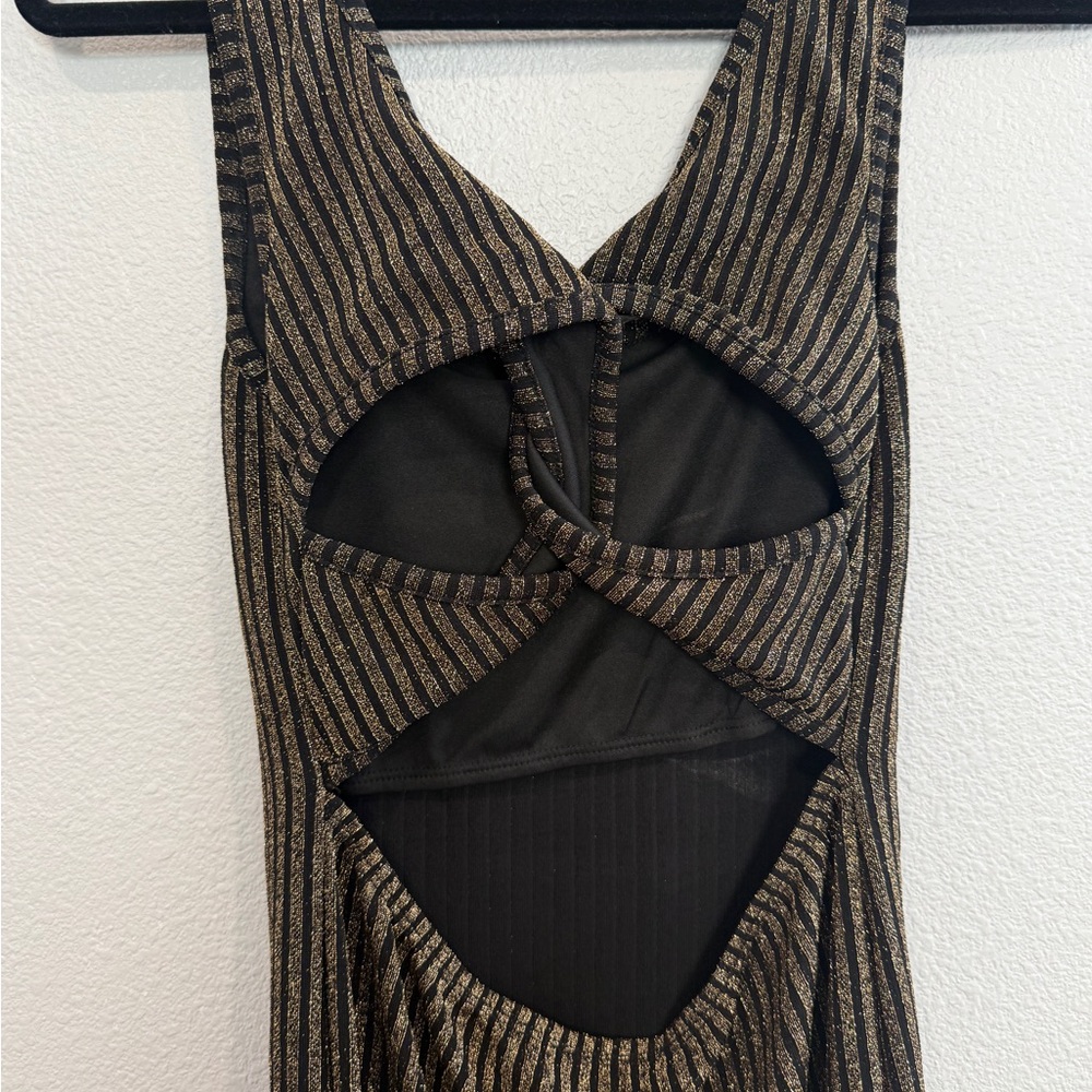Vici Ribbed Metallic-Trim Maxi Dress in Black and Gold twist open back and slit